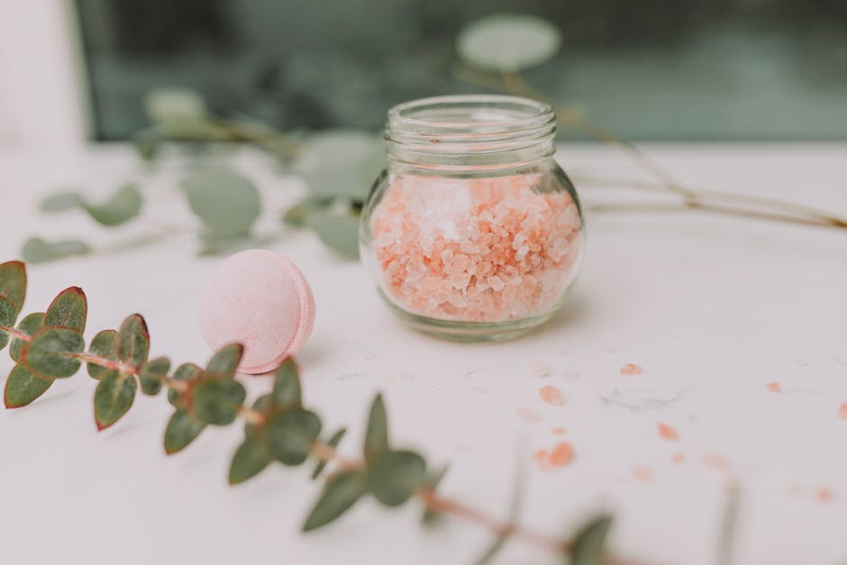 Calming spa scene featuring pink bath salt and eucalyptus