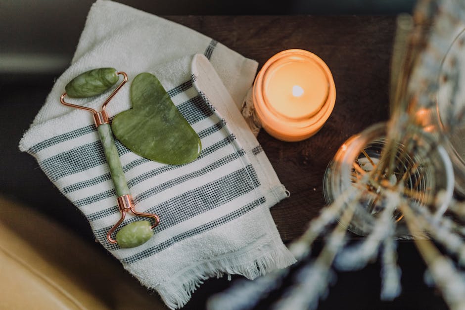 A serene spa setup featuring jade roller and gua sha